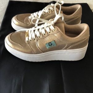 GUESS. Gold thick sole sneakers. Barely worn.